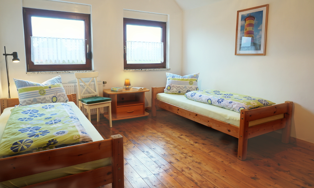 Schlafzimmer_Oben Ferienwohnung FEWO Hesel Schlafzimmer Oben